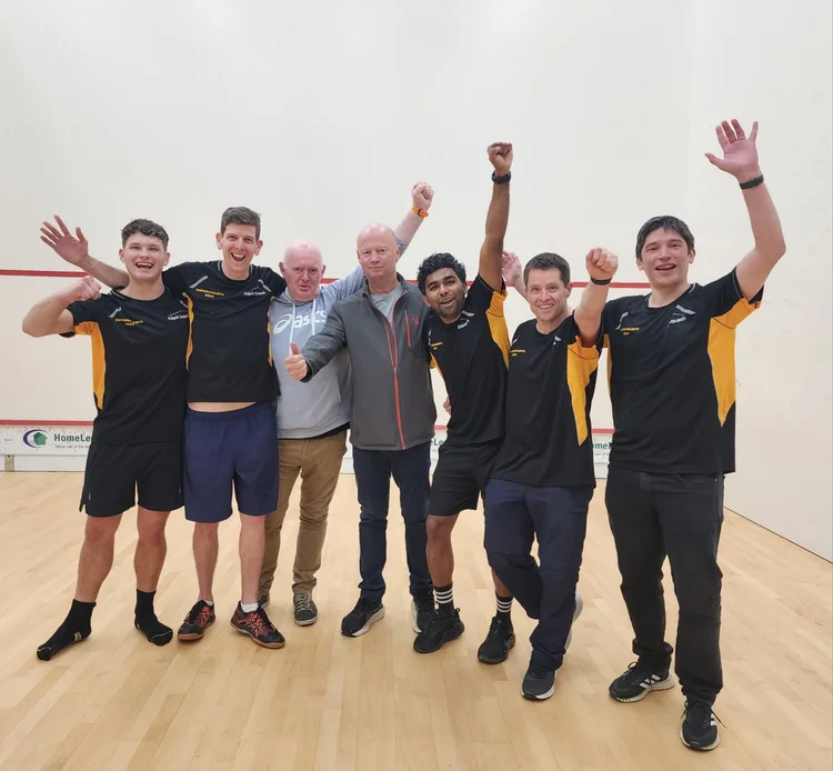 Kāpiti Squash Club players celebrating together on court