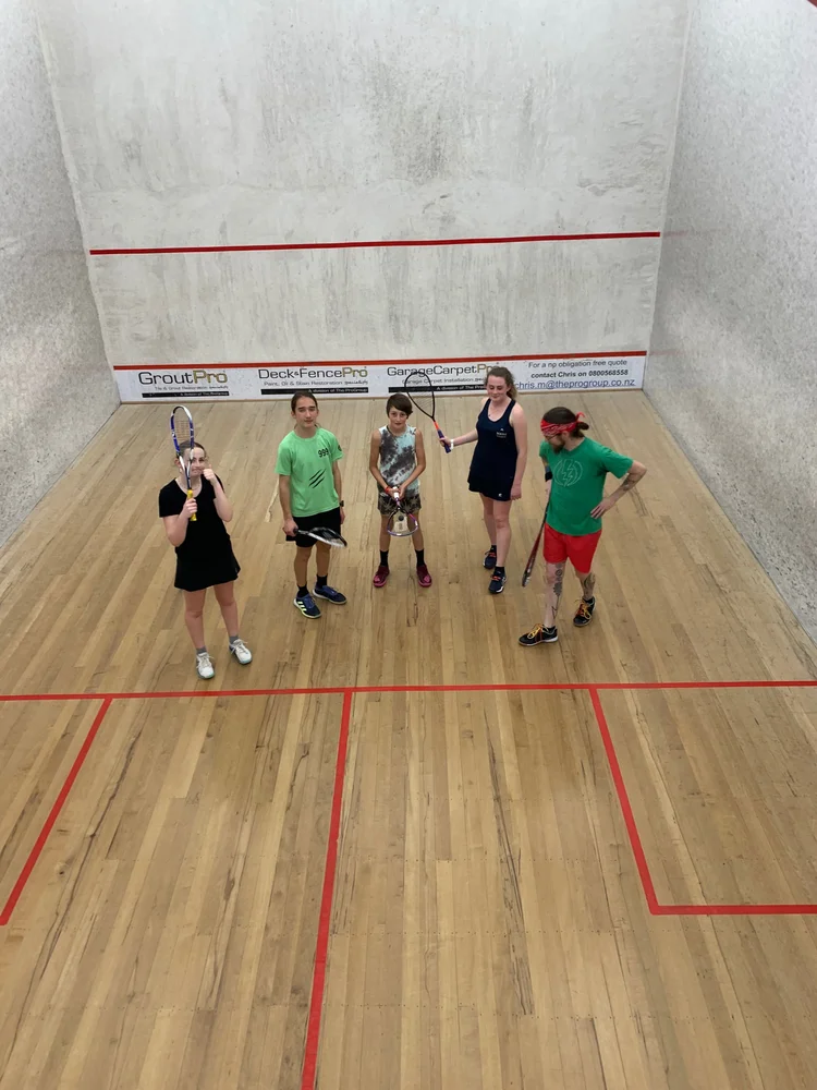 Junior players on court at Kāpiti Squash Club